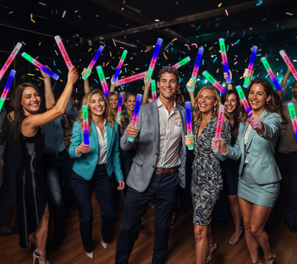 Energetic professionals letting loose with personalised glow sticks at a fun corporate party.