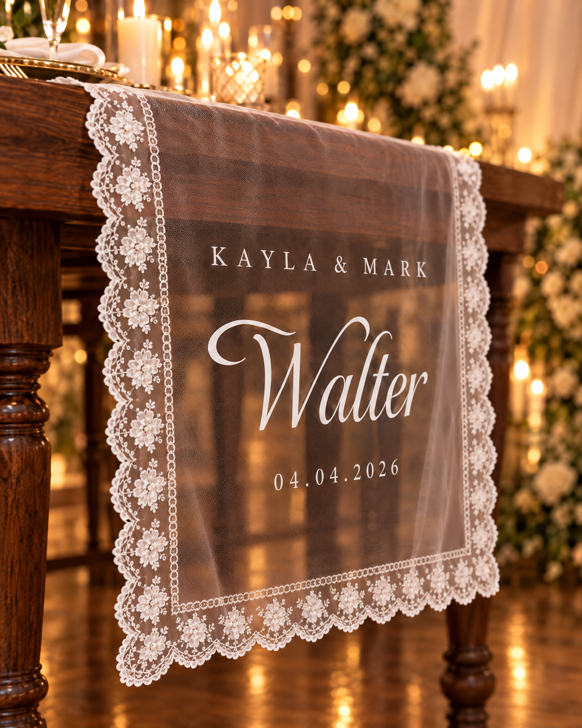 Close-up of the sheer tulle and lace trim with white personalised lettering