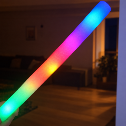 Single multicolour LED foam glow stick held up indoors